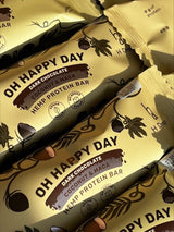Oh Happy Day - kanepi proteiinibatoonid kookose ja macaga tumedas šokolaadis (1 tk.) H Drop Lietuva